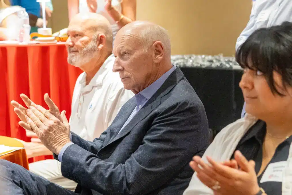Attendees applaud during a Life Science Oklahoma networking event.