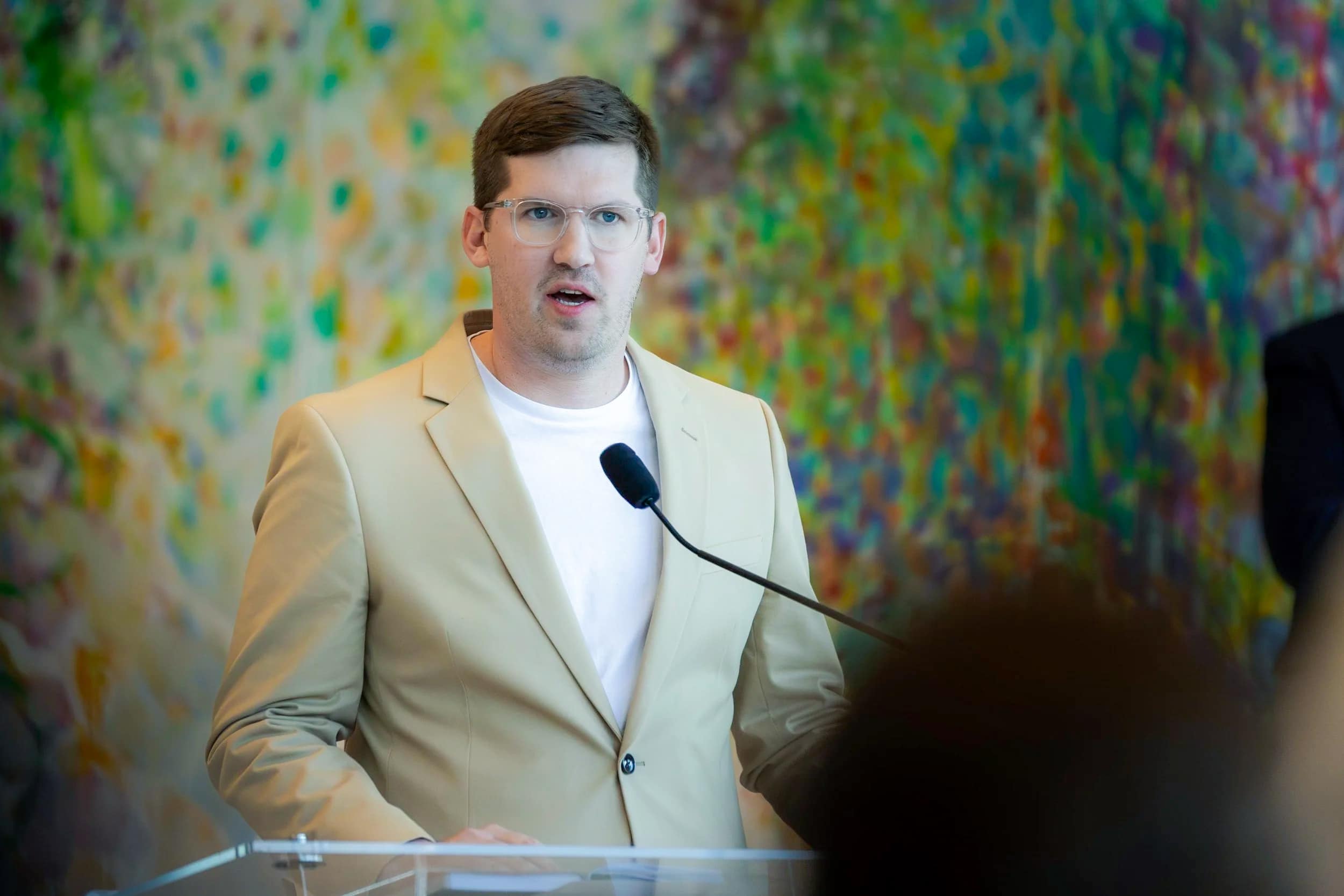 Jeff Seymour speaks at a podium during the Innovation Hall ribbon-cutting ceremony.